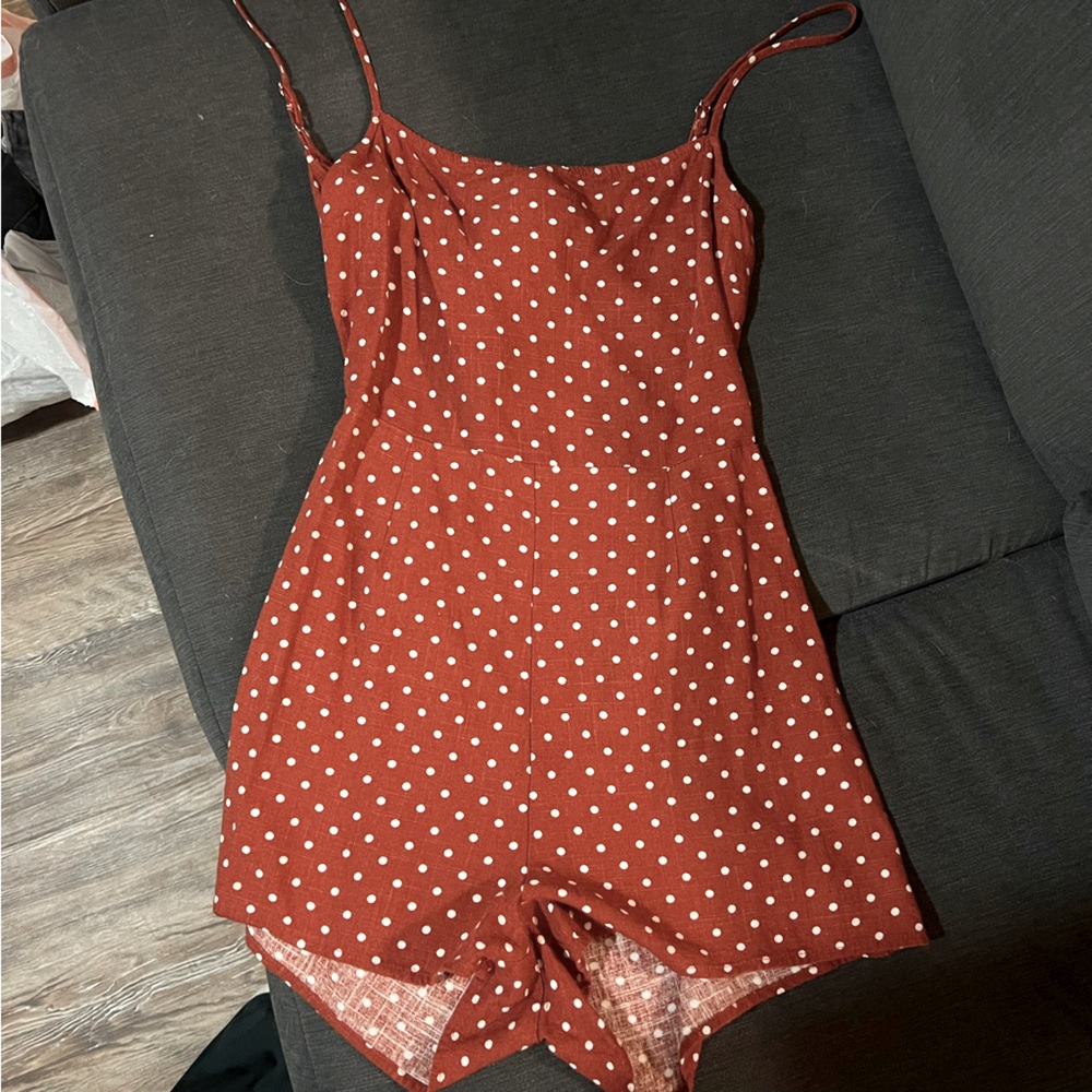 Polka dot romper from Pacsun.